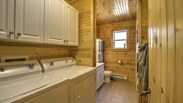 Combined shower/bathtub, towels, soap, toilet paper
