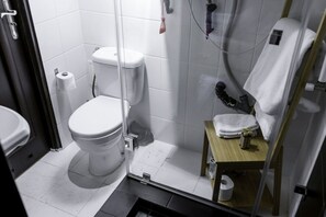 Comfort Apartment | Bathroom | Shower, hair dryer, towels, soap