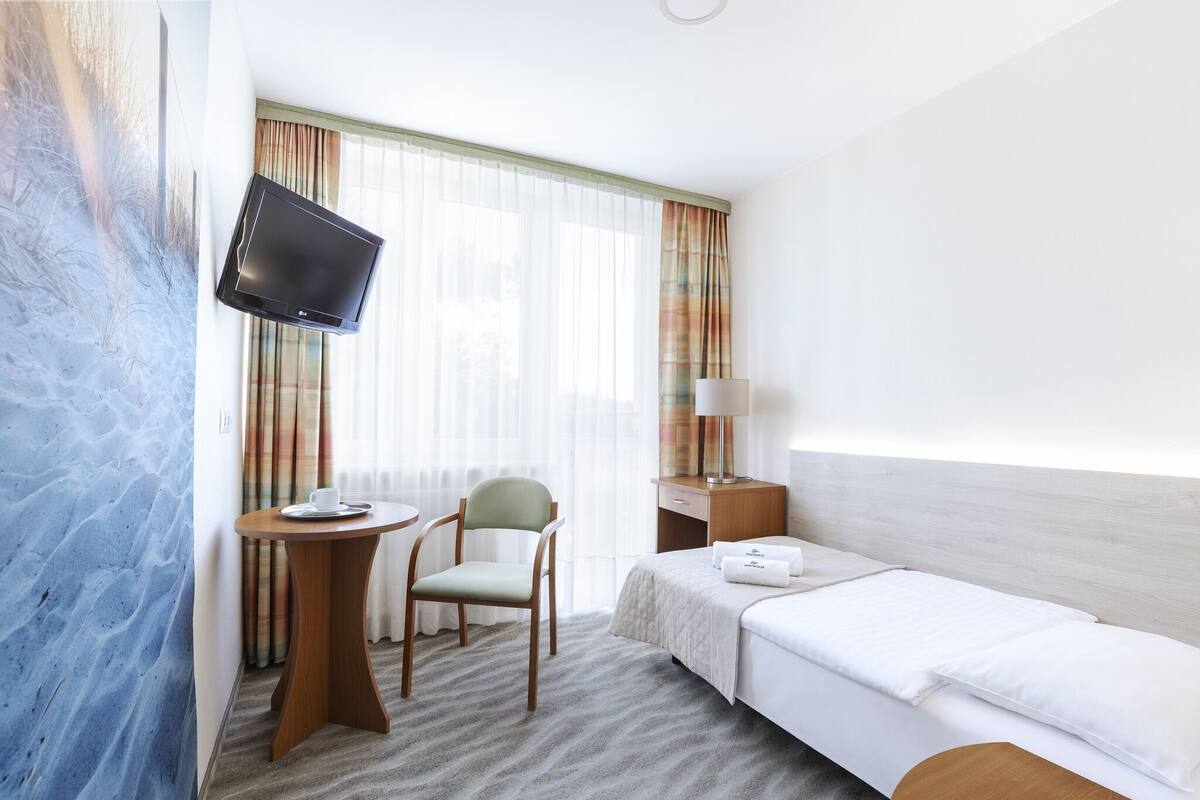 Desk, cots/infant beds, free WiFi, bed sheets