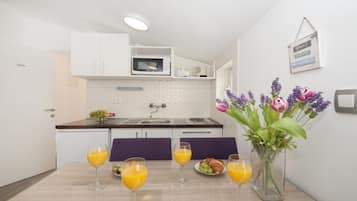 Apartment (1 Bedroom Apt with Terrace n Sea View) | Private kitchen | Fridge
