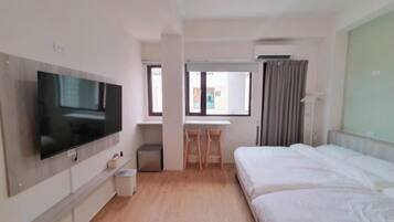 Habitación cuádruple familiar | Insonorización, wifi gratis y ropa de cama