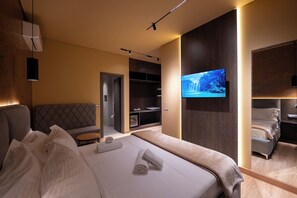 Deluxe-Vierbettzimmer, Meerblick | Hochwertige Bettwaren, Daunenbettdecken