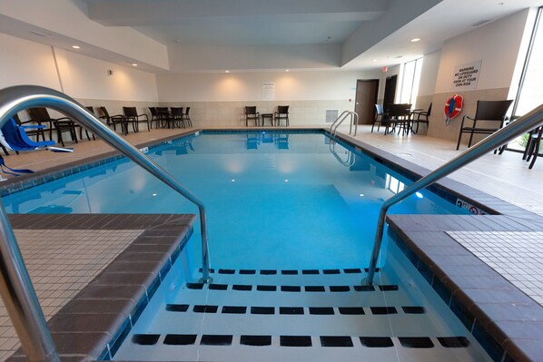 Indoor pool, open 7:00 AM to 10:00 PM, pool loungers