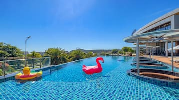 3 outdoor pools, open 8:30 AM to 6:30 PM, pool loungers