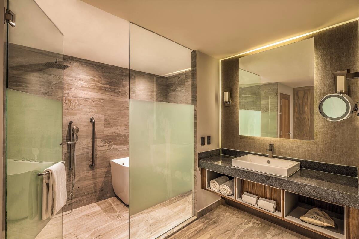 eco-friendly toiletries, hair dryer, towels, soap