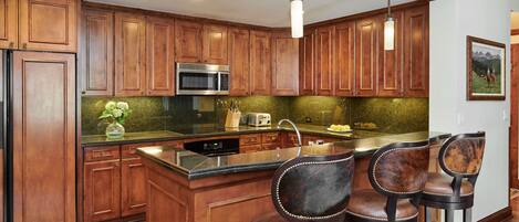 Microwave, dishwasher, coffee/tea maker, cookware/dishes/utensils