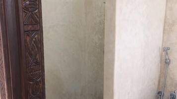 Double Room | Bathroom | Shower, rainfall showerhead, towels, soap