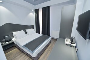 أغطية فراش متميزة ومكواة/لوح كي وأسرّة قابلة للطي وواي فاي مجانًا