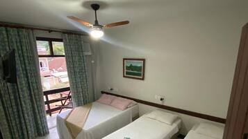 Premium Quadruple Room | Minibar, blackout drapes, free WiFi, bed sheets