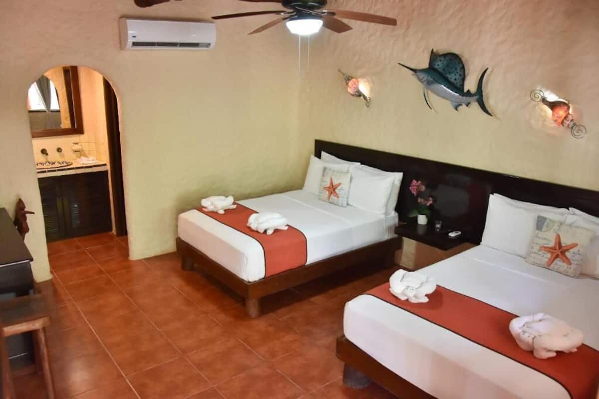 Habitación familiar | Caja fuerte, wifi gratis, ropa de cama