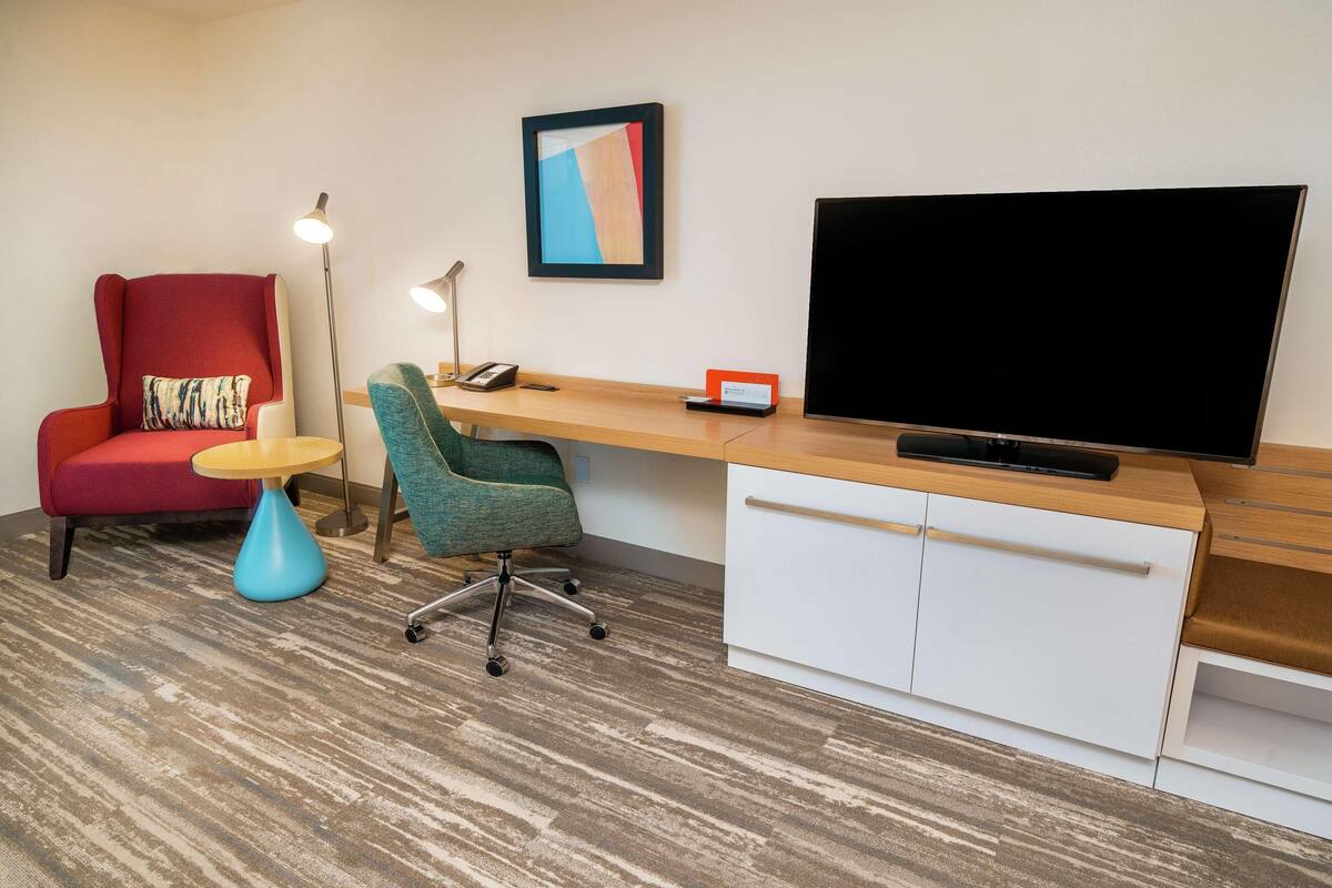 Premium bedding, pillowtop beds, desk, laptop workspace