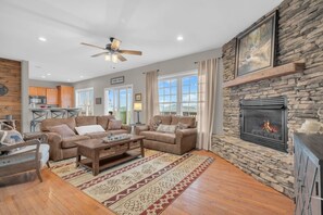 Flat-screen TV, fireplace, table tennis