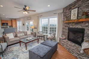 Flat-screen TV, fireplace, ping pong