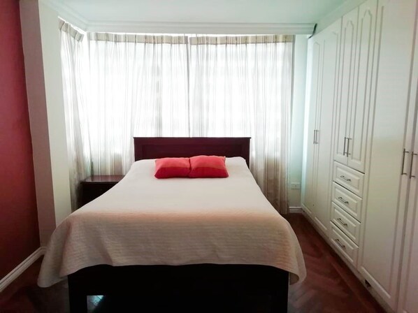 Blackout curtains, iron/ironing board, free WiFi, bed sheets