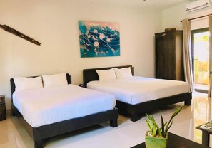 Standard Quadruple Room (North Wind) | Minibar, in-room safe, individually decorated, individually furnished - MiNhon Hotel Mui Ne (Phan Thiet)