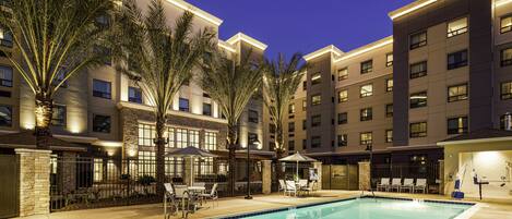 Outdoor pool, open 8:00 AM to 10:00 PM, pool umbrellas, sun loungers