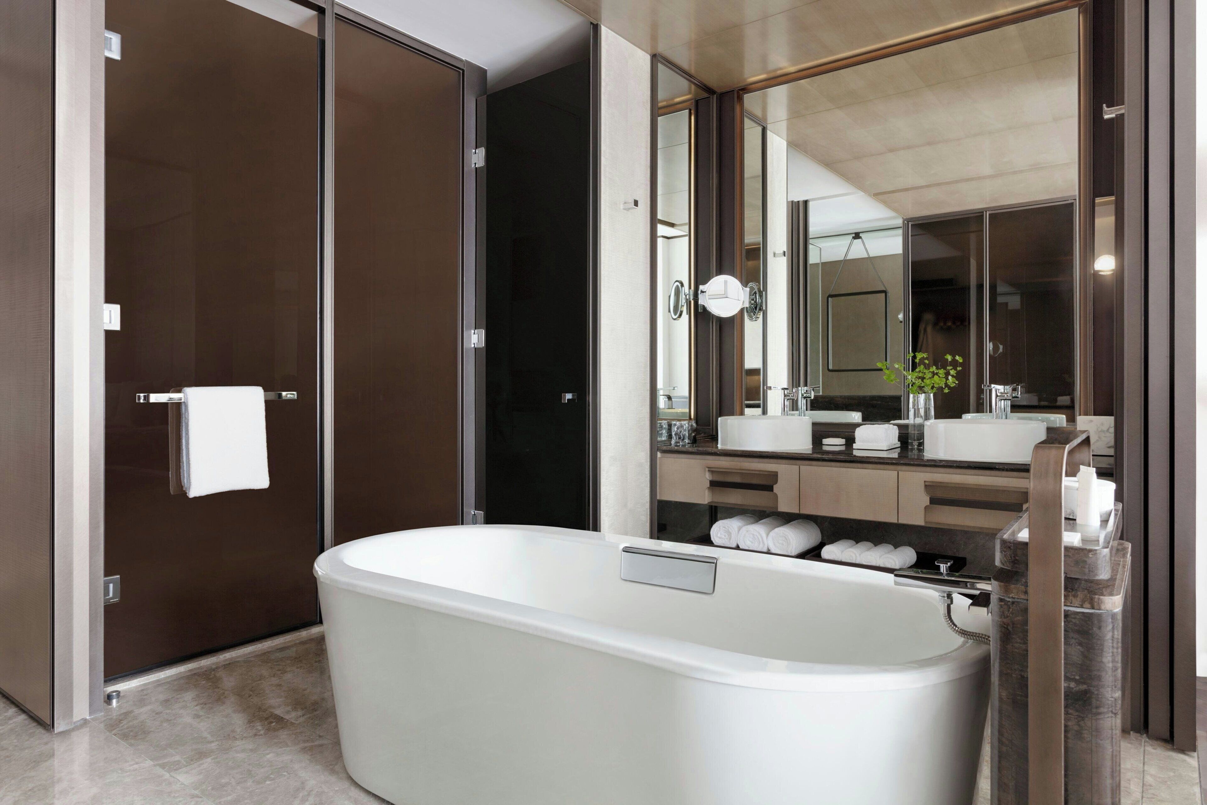 separate bathtub and shower, deep-soaking bathtub, rainfall showerhead