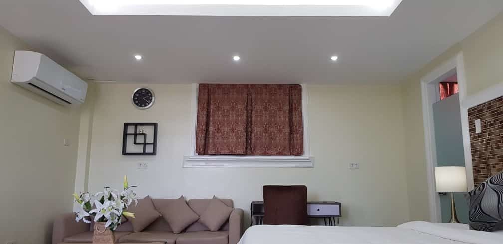 superior room | living area | flat-screen tv