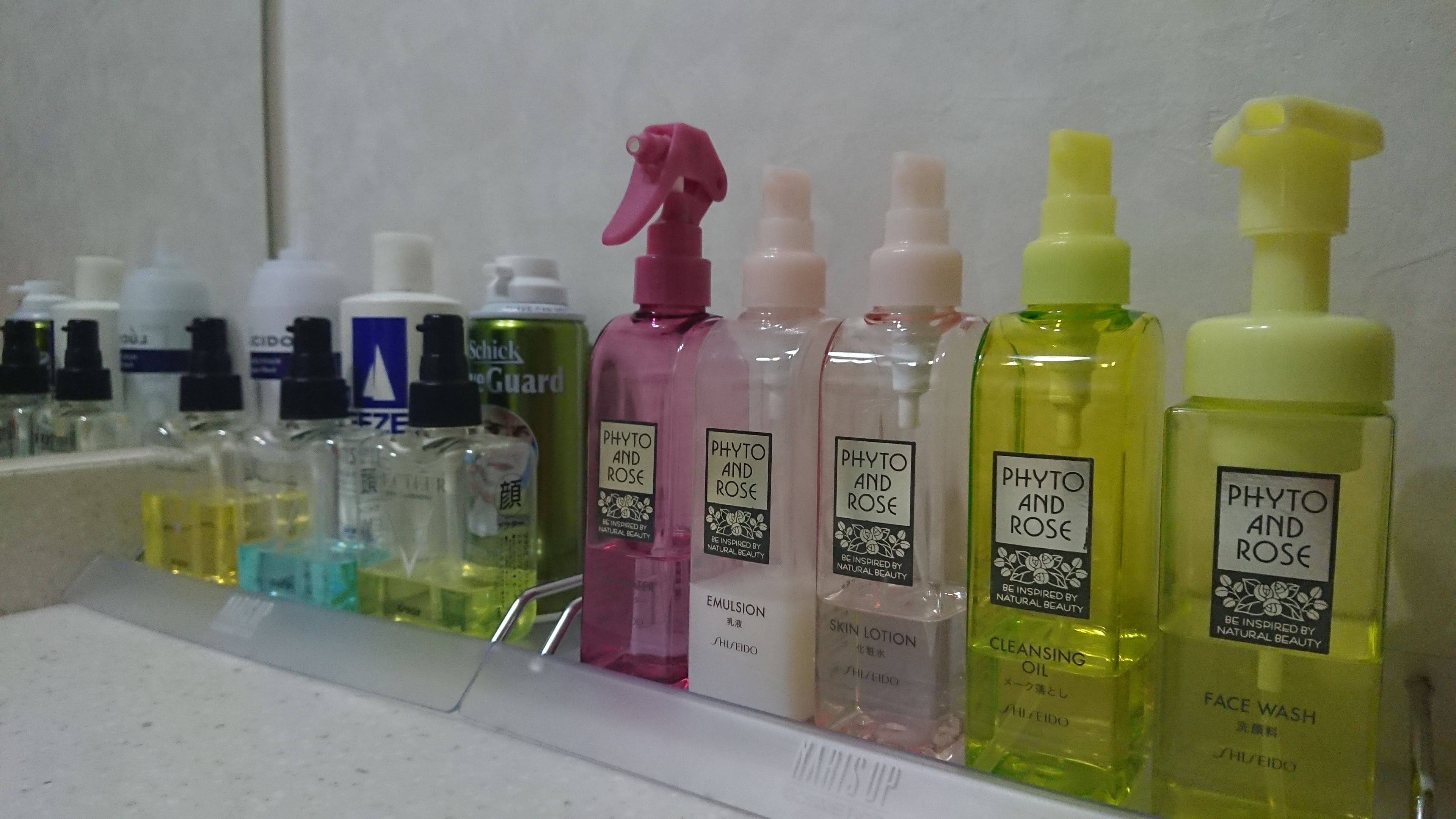A shelf with various skincare products labeled 'PHYTO AND ROSE'.