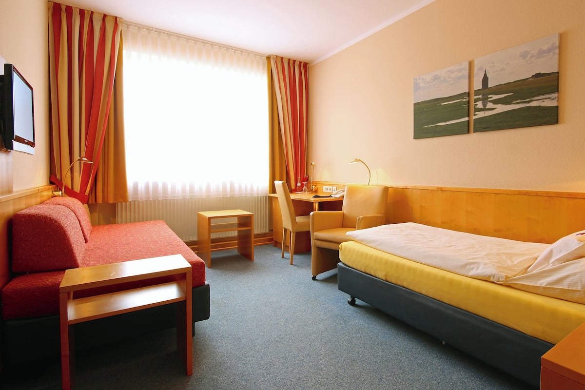 1 slaapkamer, een kluis op de kamer, verduisterende gordijnen