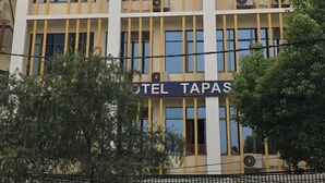 A multi-story building with a sign that reads "Shri Krishna Hotel" and "Hotel Tapas." - Hotel Tapas (Kathmandu)
