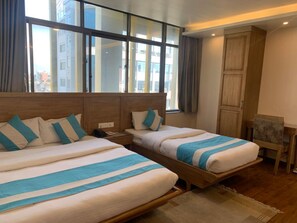 Family Room | 1 bedroom, premium bedding, minibar, in-room safe