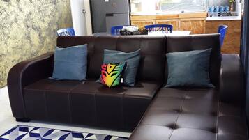 1 Bedroom Apartment | Living room | 32-inch flat-screen TV with cable channels, LED TV, Netflix