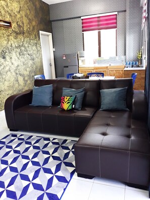 1 Bedroom Apartment | Living room | 32-inch flat-screen TV with cable channels, LED TV, Netflix - MINIMALIST Studio Apartment (Langkawi)