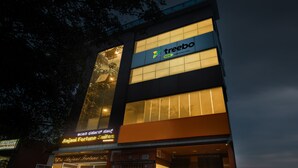A building with a sign for 'Anjani Fortune Suites' and 'treebo' on the facade. - Treebo Anjani Fortune Suites (Bengaluru)