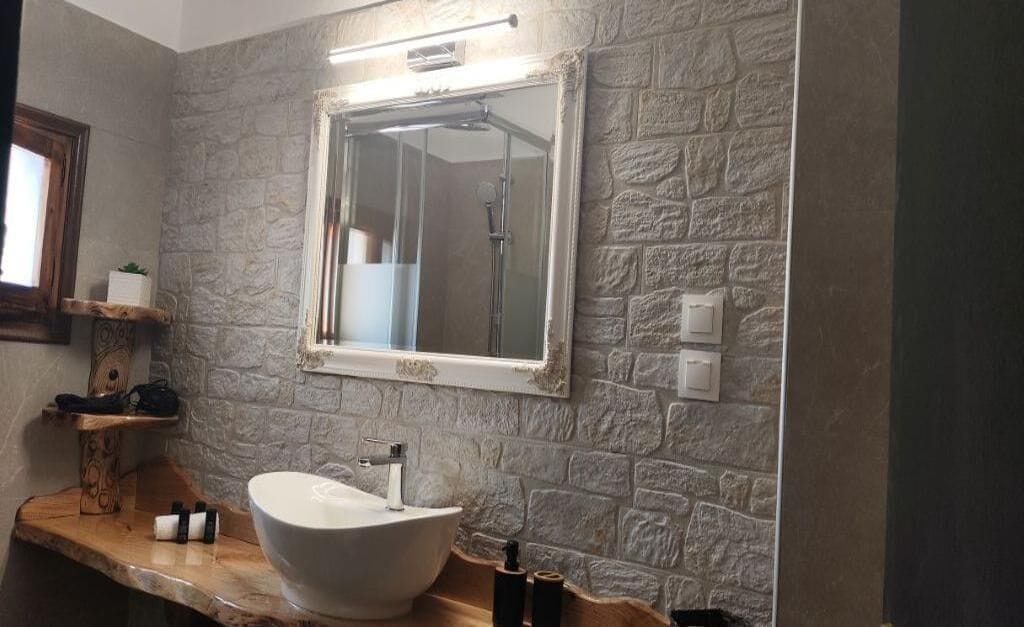 Bathtub, hair dryer, towels, soap