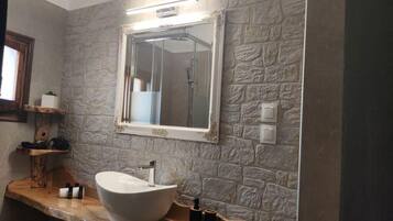 Bathtub, hair dryer, towels, soap