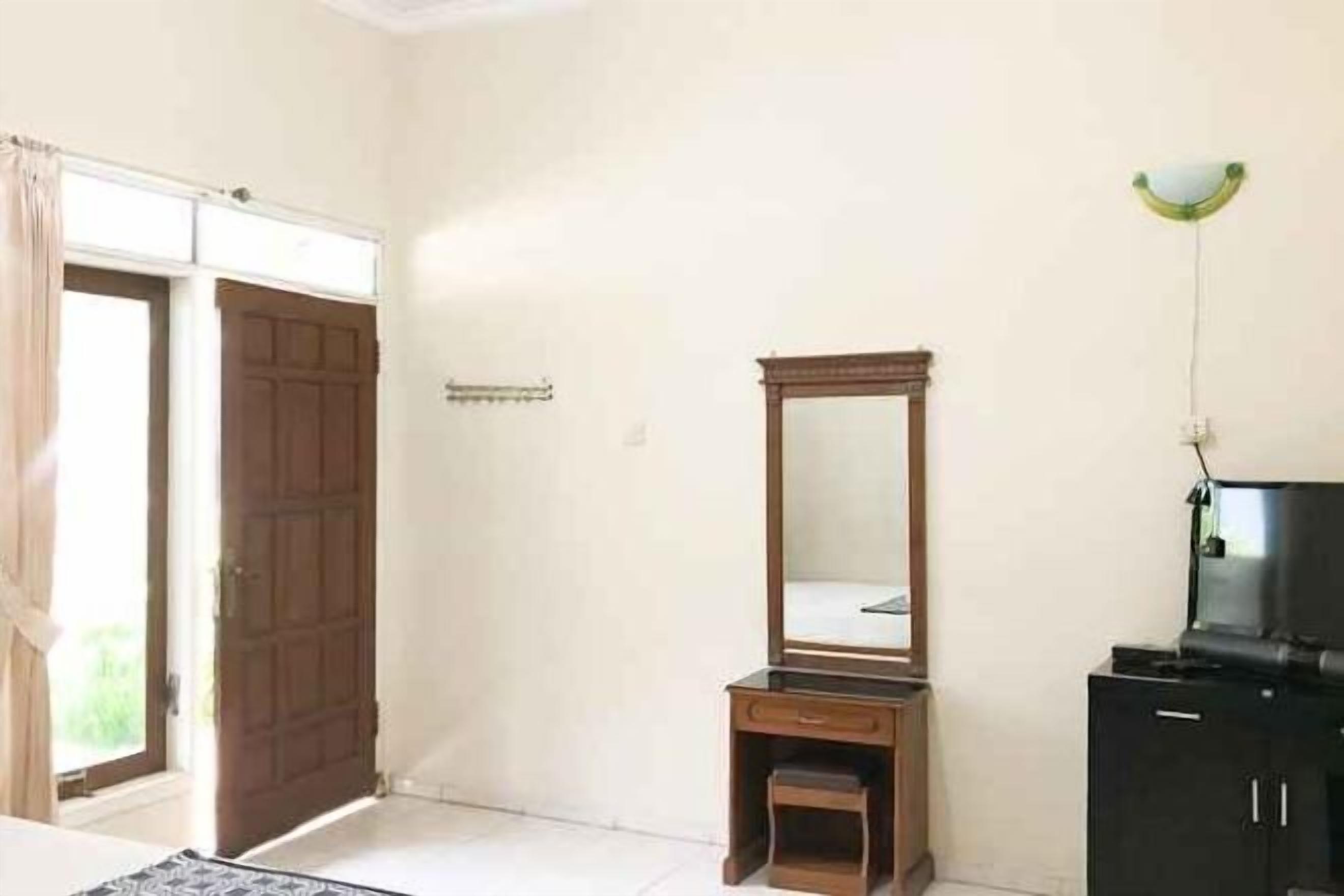 Desk, blackout drapes, bed sheets