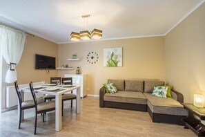 Familienapartment | Wohnbereich | Flachbildfernseher