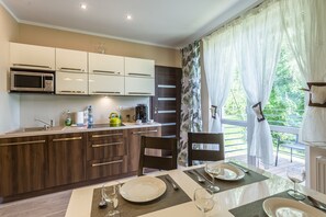 Familienapartment | Wohnbereich | Flachbildfernseher