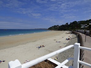 On the beach, sun-loungers