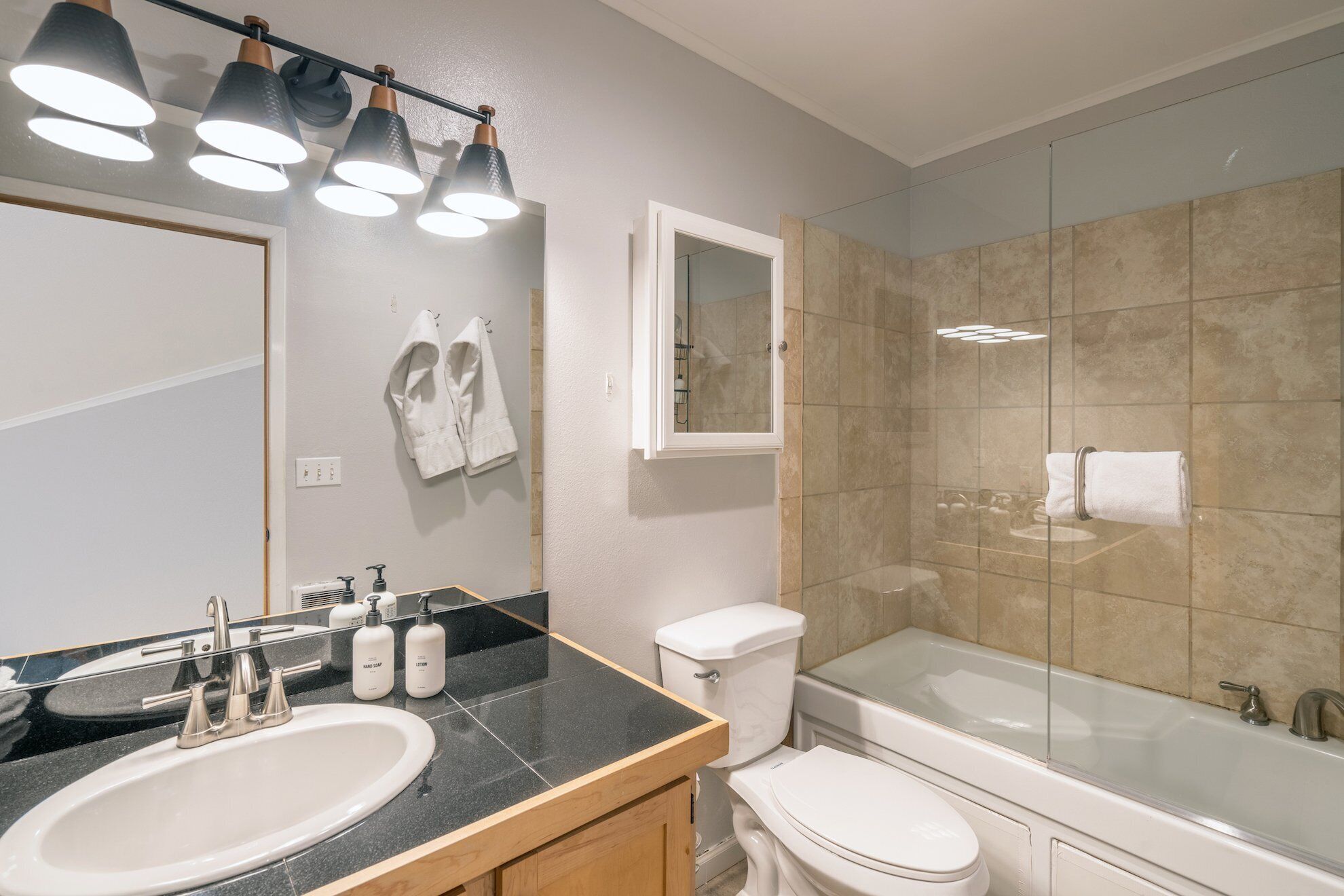 Bathtub, hair dryer, towels
