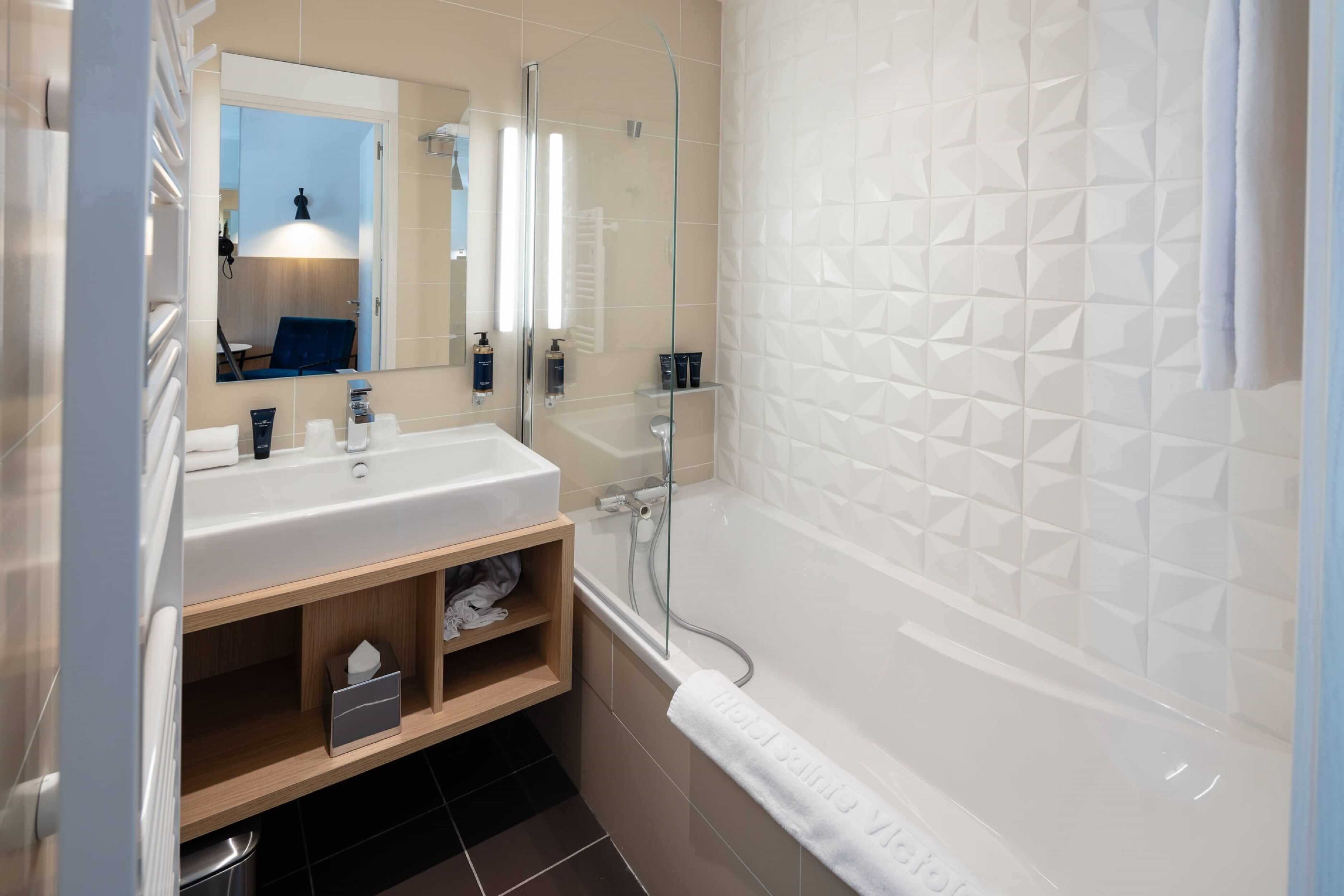 rainfall showerhead, designer toiletries, hair dryer, slippers