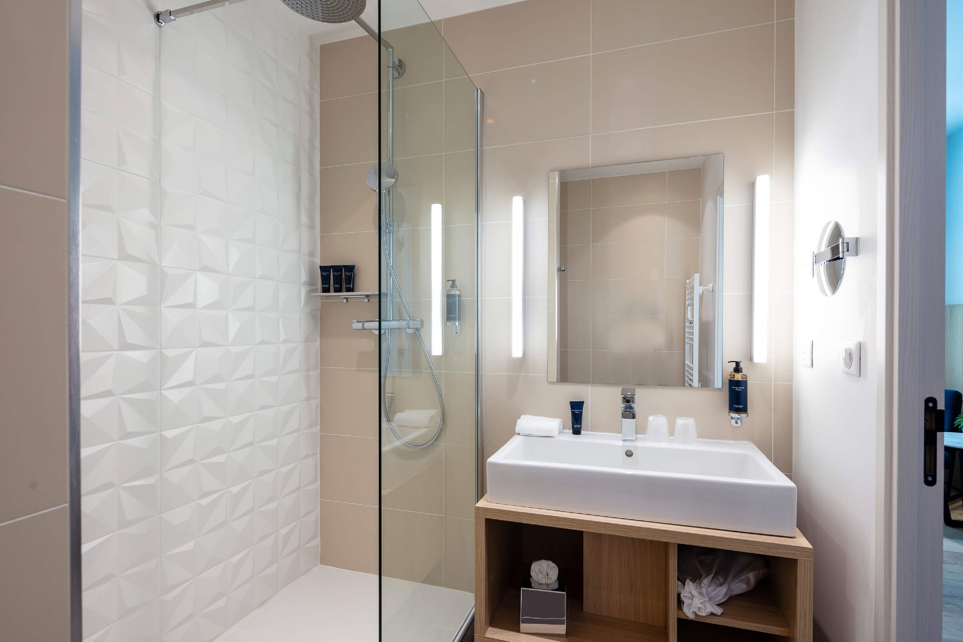 rainfall showerhead, designer toiletries, hair dryer, slippers