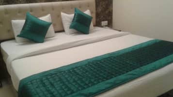 Tabla de planchar con plancha, cunas, wifi gratis y ropa de cama