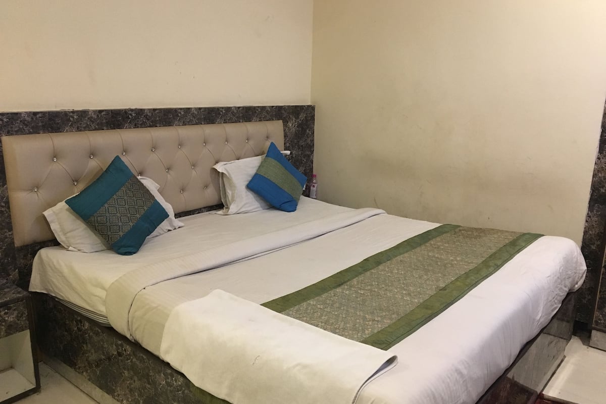 Deluxe kamer | Een strijkplank/strijkijzer, babybedden, gratis wifi, beddengoed
