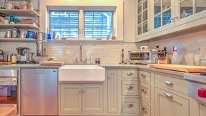Microwave, coffee/tea maker, toaster, cookware/dishes/utensils