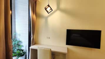 City Twin Room | Down comforters, desk, blackout drapes, soundproofing