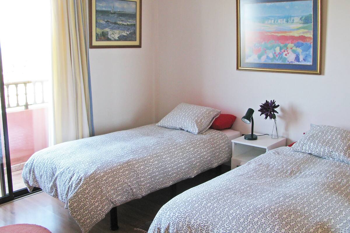 Twin Room, Shared Bathroom (Heidi) | Down comforters, memory foam beds, minibar, blackout drapes