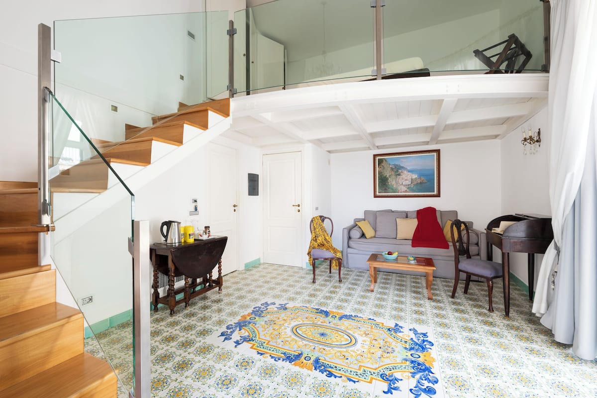 Deluxe Suite, Mezzanine | 1 bedroom, individually decorated, individually furnished, desk