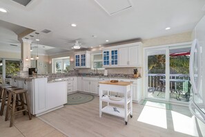 Fridge, microwave, oven, stovetop - TARPON COVE - Coastal island home on a private island (Captiva)