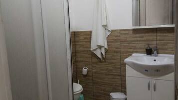 Panoramic Apartment, 1 Bedroom | Bathroom | Combined shower/tub, rainfall showerhead, free toiletries, hair dryer