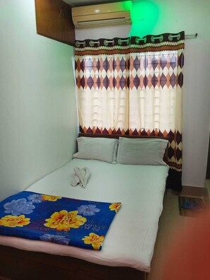 Comfort Single Room, Non Smoking, City View | Down comforters, desk, laptop workspace, soundproofing - Hotel As Shams international (Dhaka)
