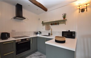 舒適平房, 1 間臥室 | 私人廚房 | 電冰箱、微波爐��、烤箱、爐台