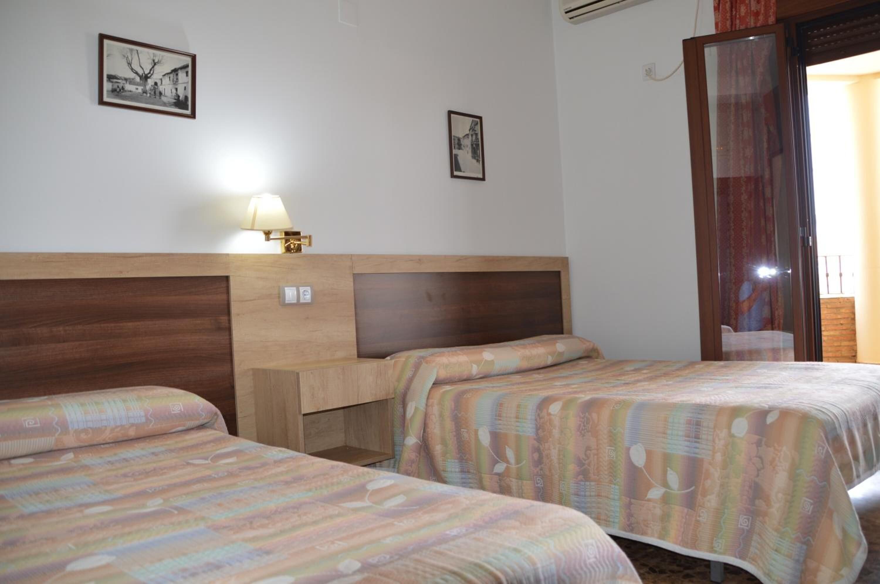 Blackout drapes, WiFi (free), bed sheets