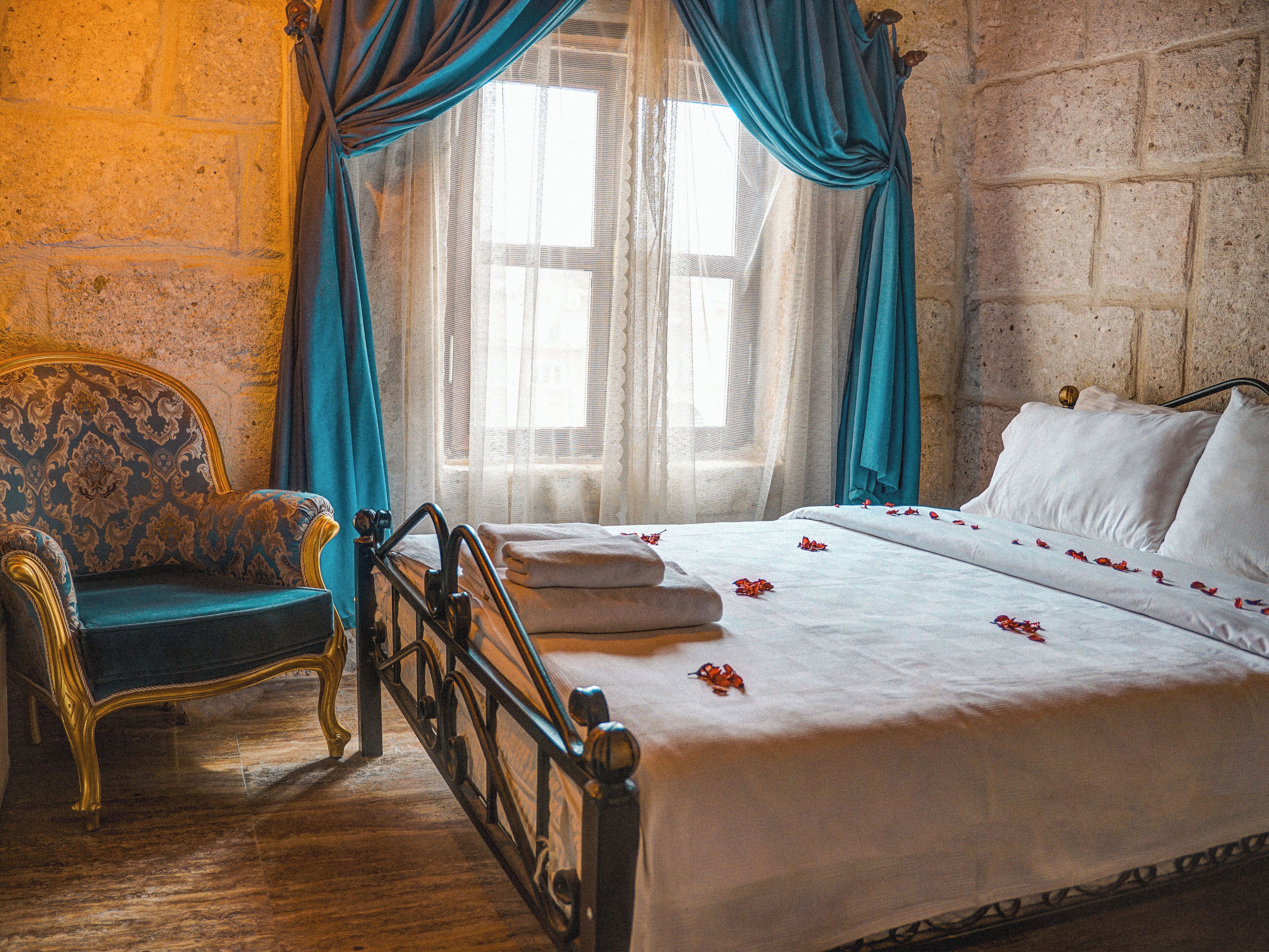 Efe Stone Room | 1 bedroom, premium bedding, down comforters, memory foam beds